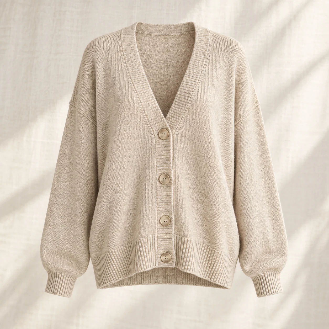 Cloud Slouch Cardigan in oat, clothing product photograph